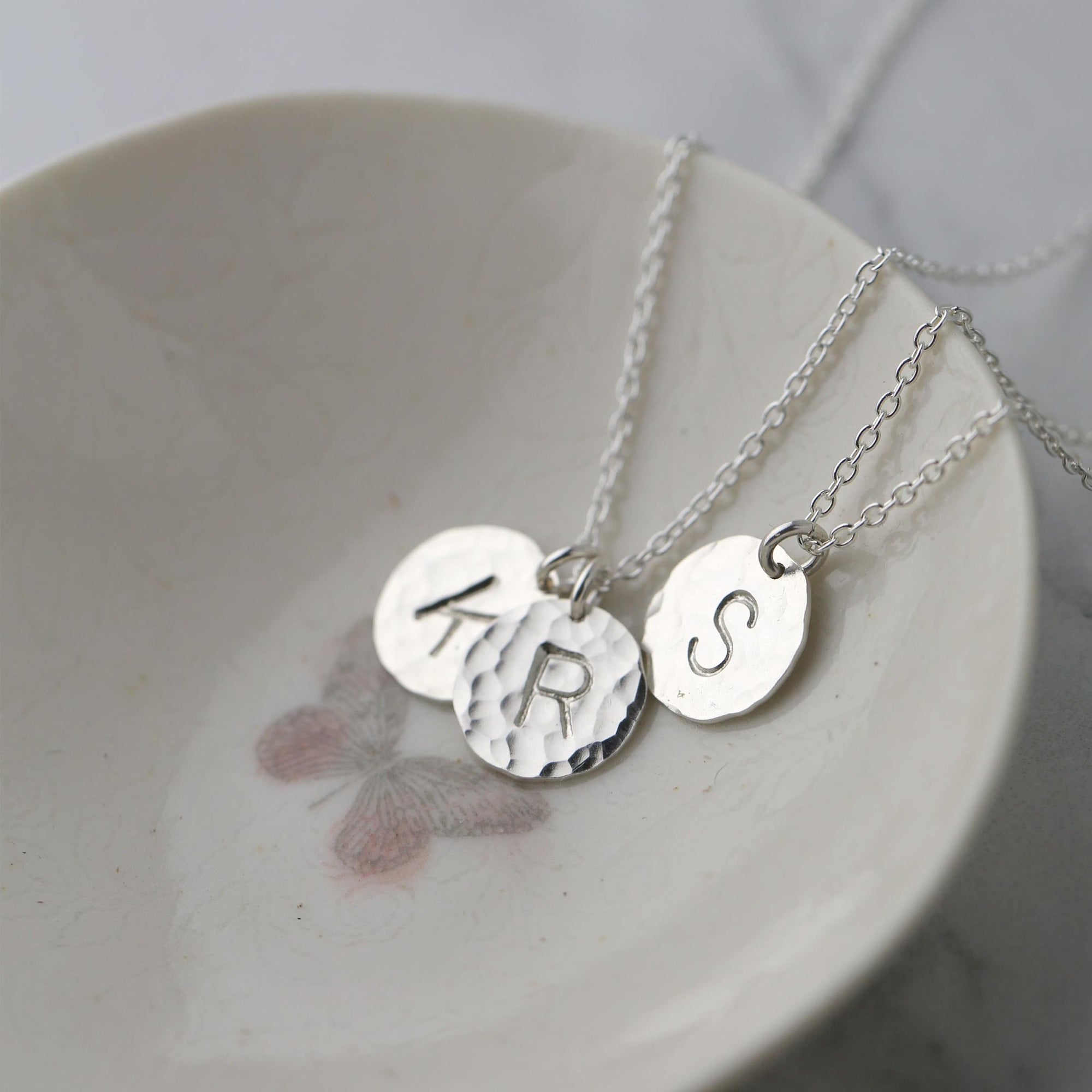 Hammered Silver Initial Disc Necklace jewelry handmade by Burnish