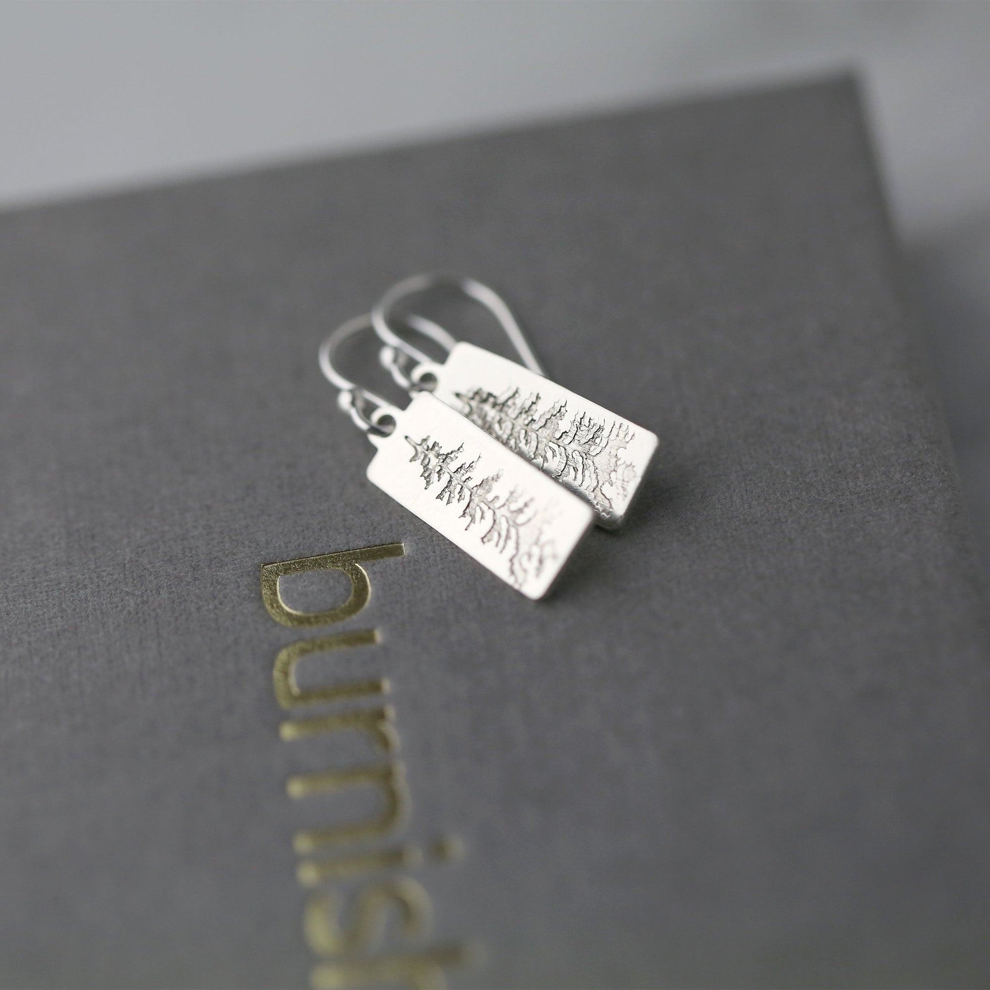 Evergreen Tree Tag Earrings jewelry handmade by Burnish