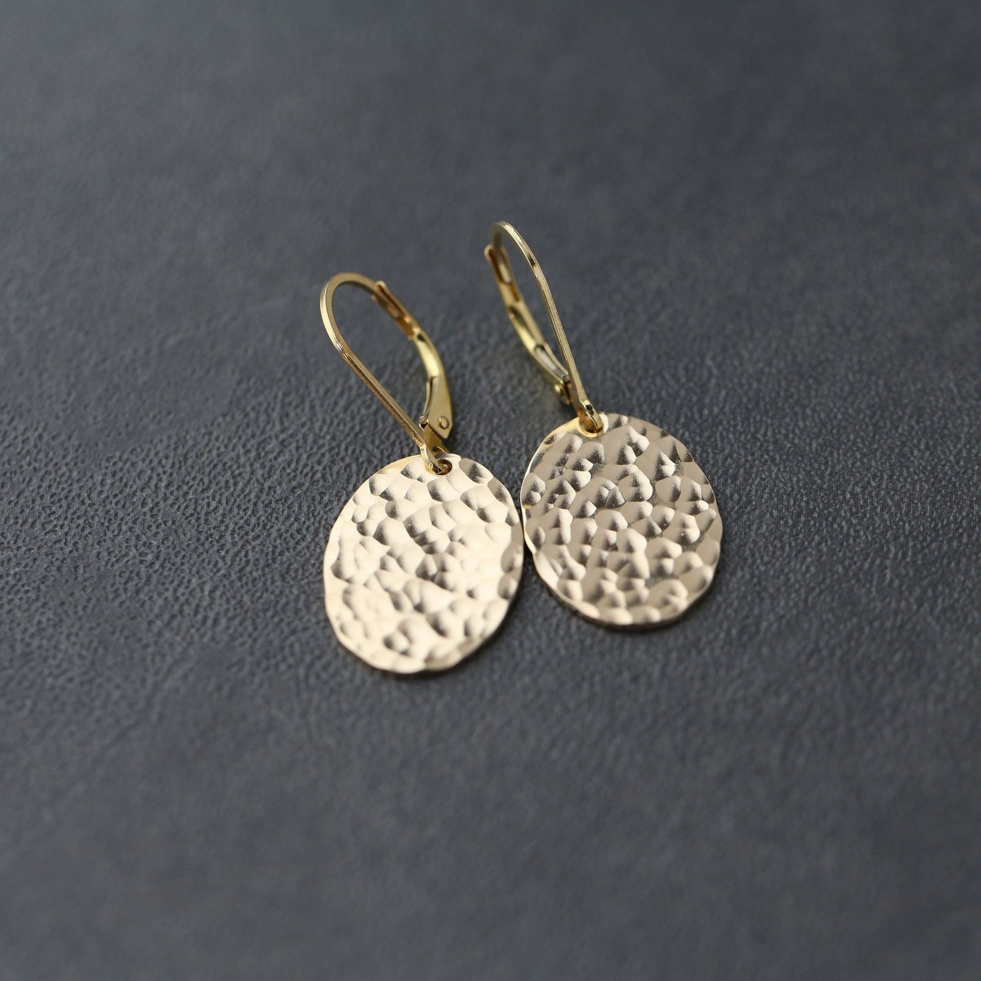 Oval Hammered Gold Lever-back Earrings handmade by Burnish