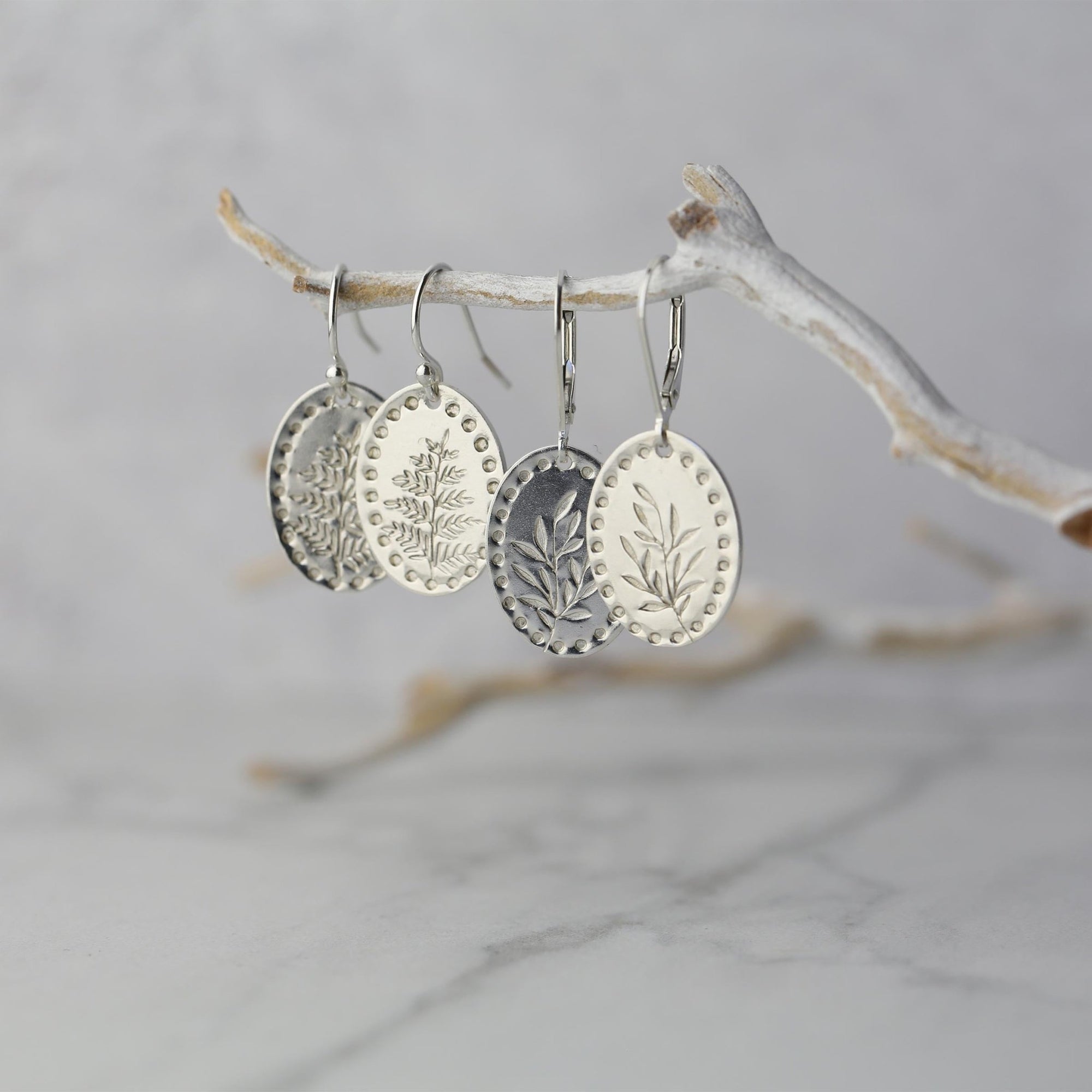 Silver Oval Stamped Leaf Earrings handmade by Burnish