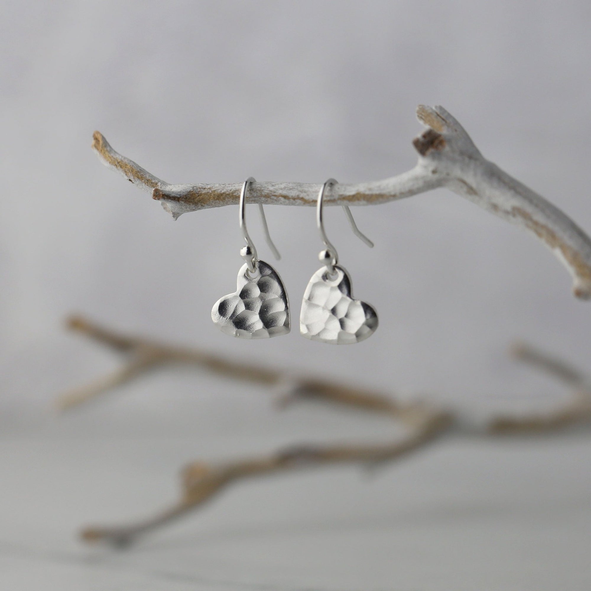 Small Hammered Heart Earrings handmade by Burnish