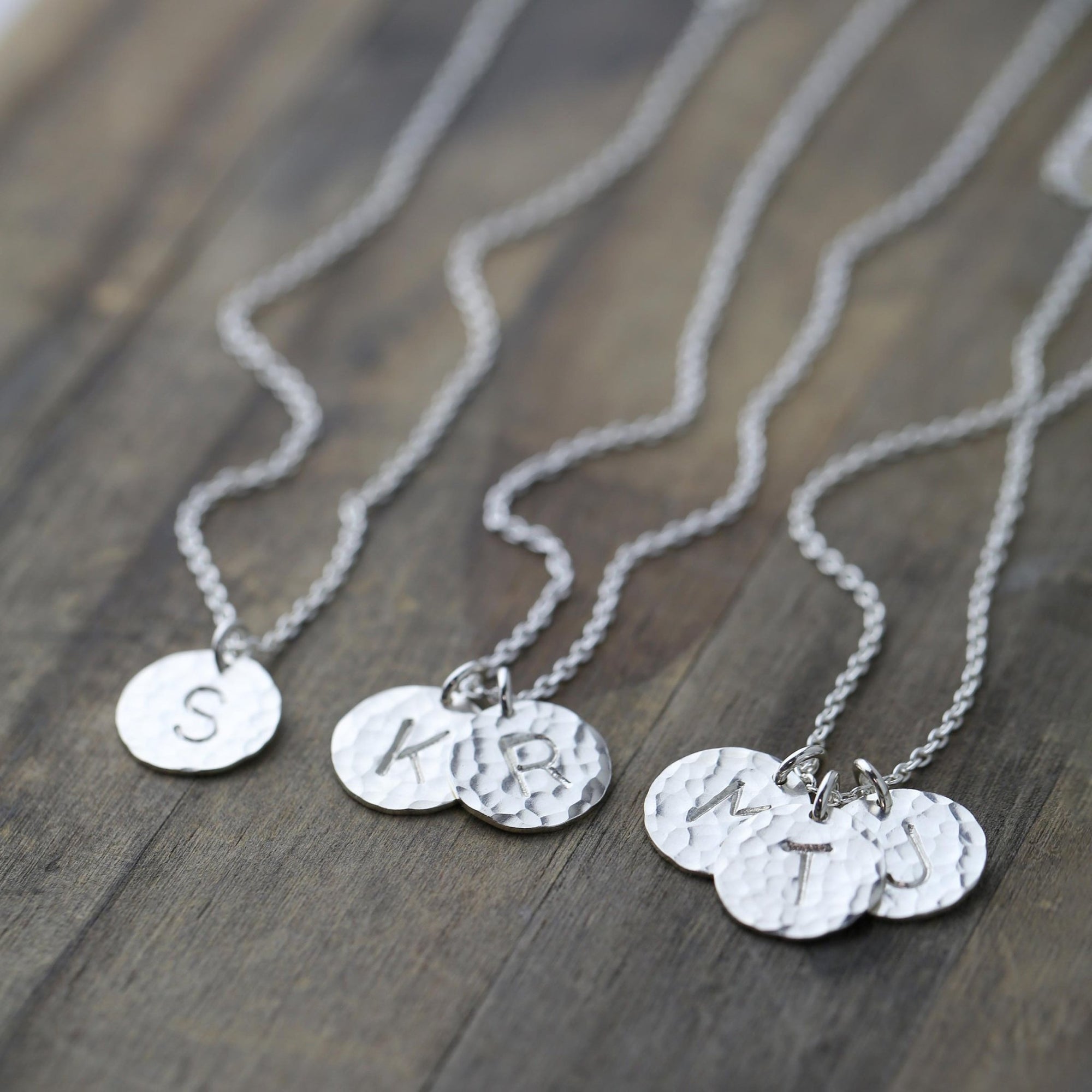 Hammered Silver Initial Disc Necklace jewelry handmade by Burnish
