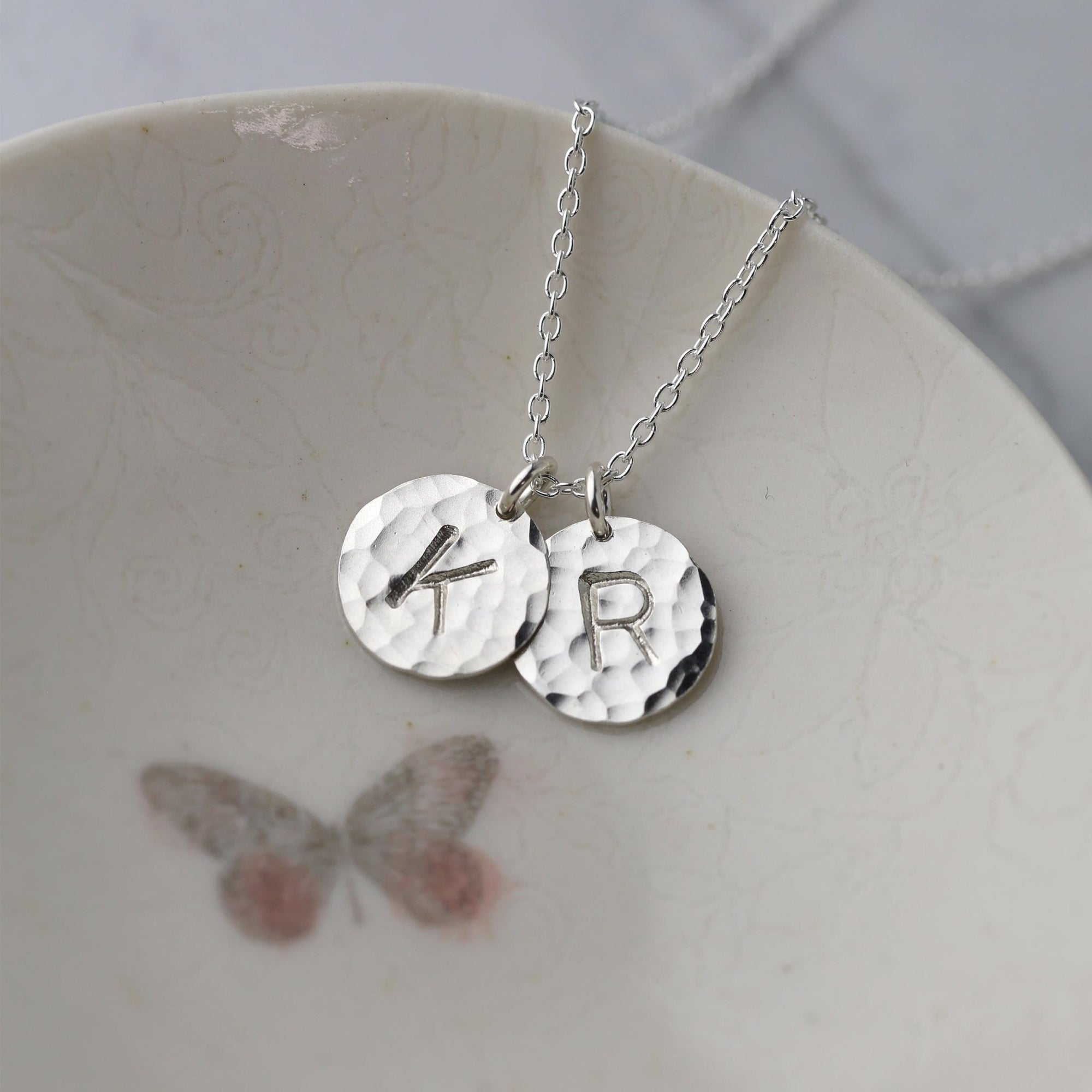 Hammered Silver Initial Disc Necklace jewelry handmade by Burnish
