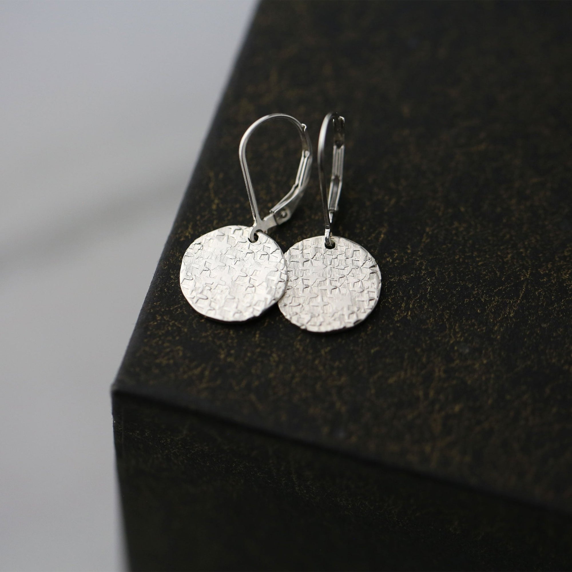 Silver Raw Silk Texture Disc Earrings jewelry handmade by Burnish