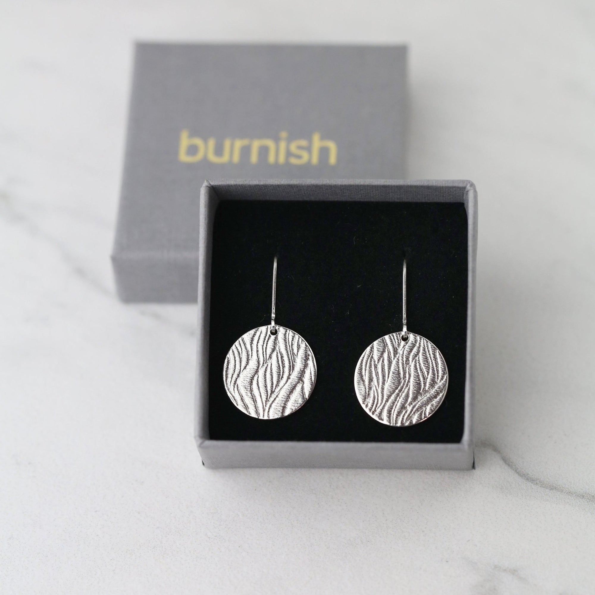 Silver Waves Disc Earrings jewelry handmade by Burnish