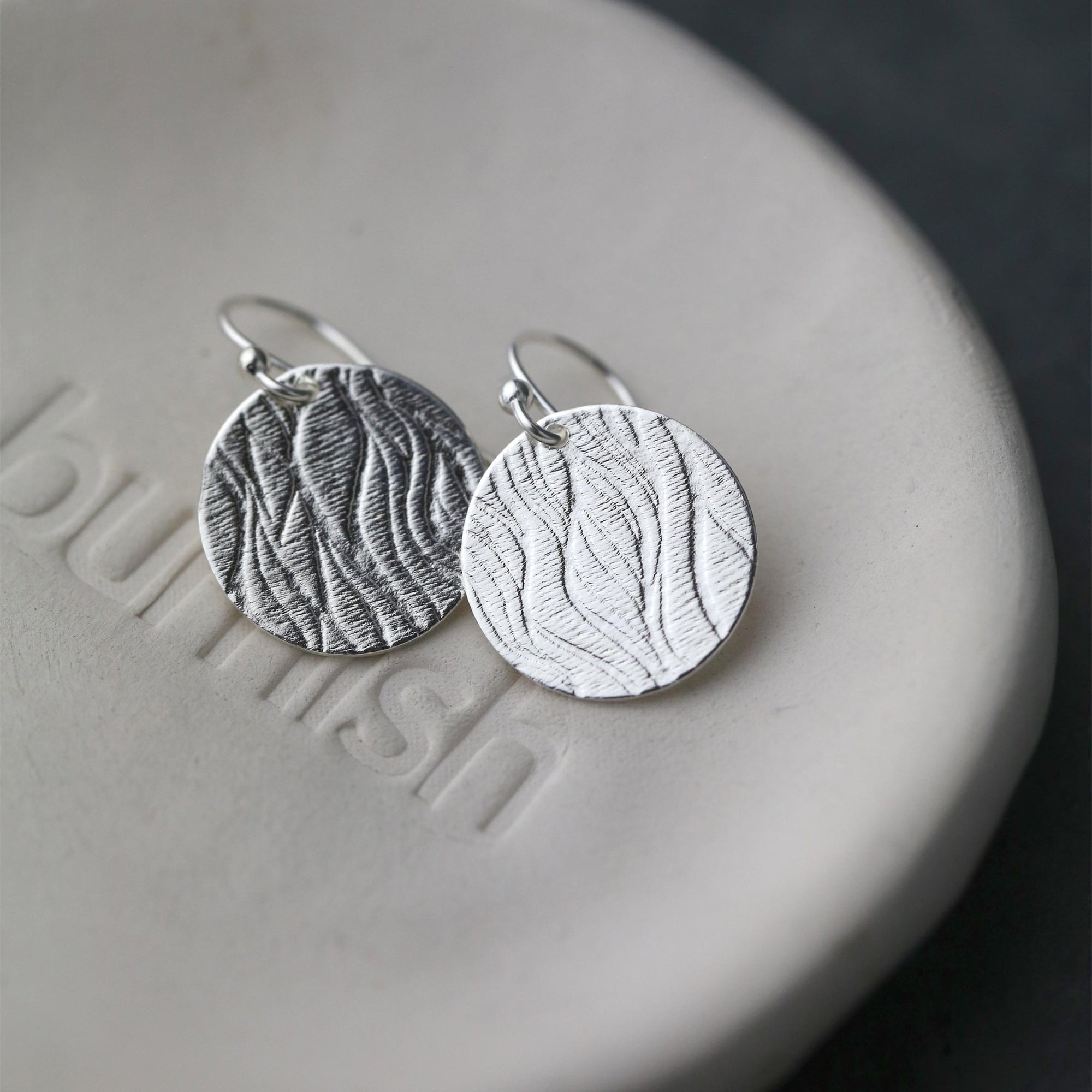 Silver Waves Disc Earrings jewelry handmade by Burnish