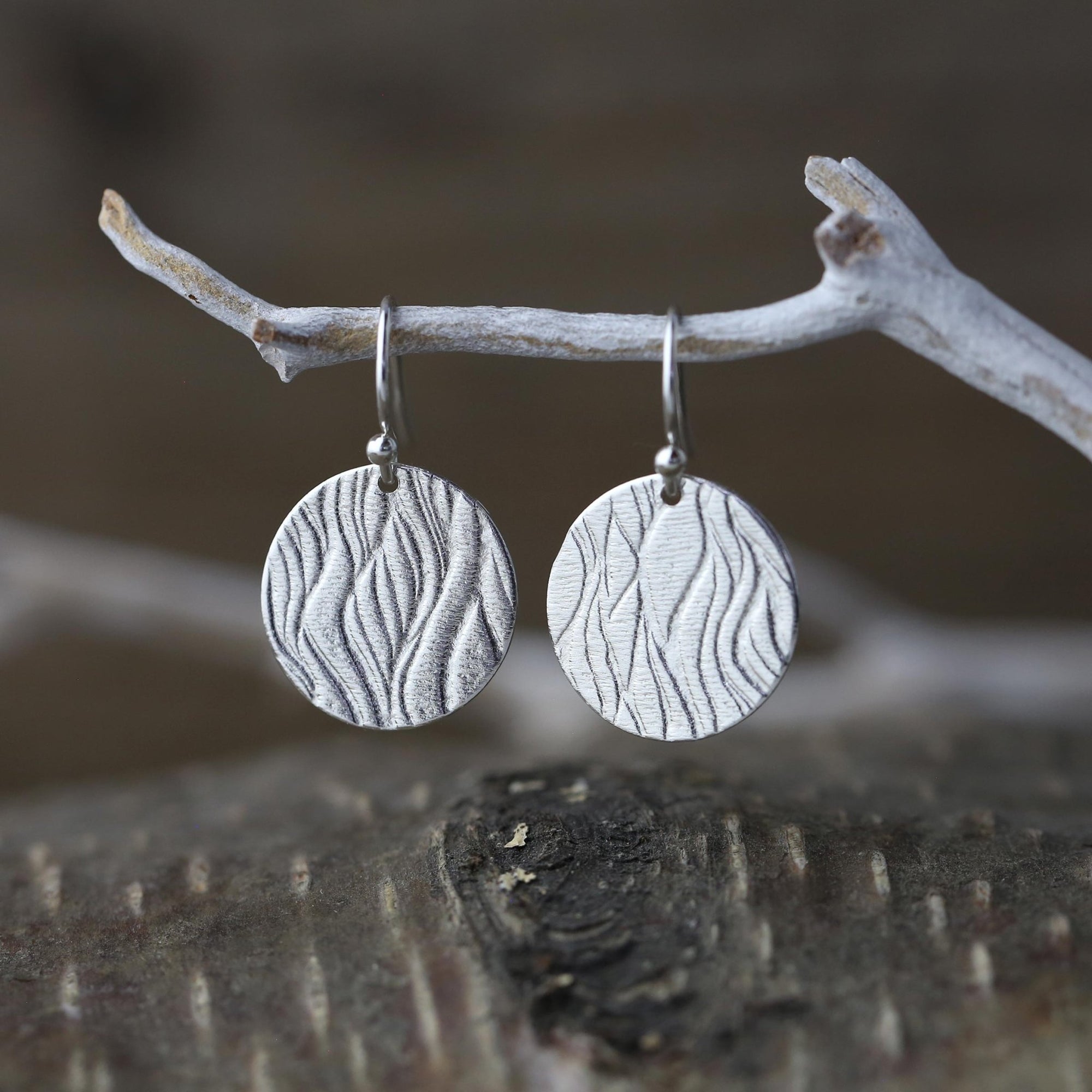 Silver Waves Disc Earrings jewelry handmade by Burnish