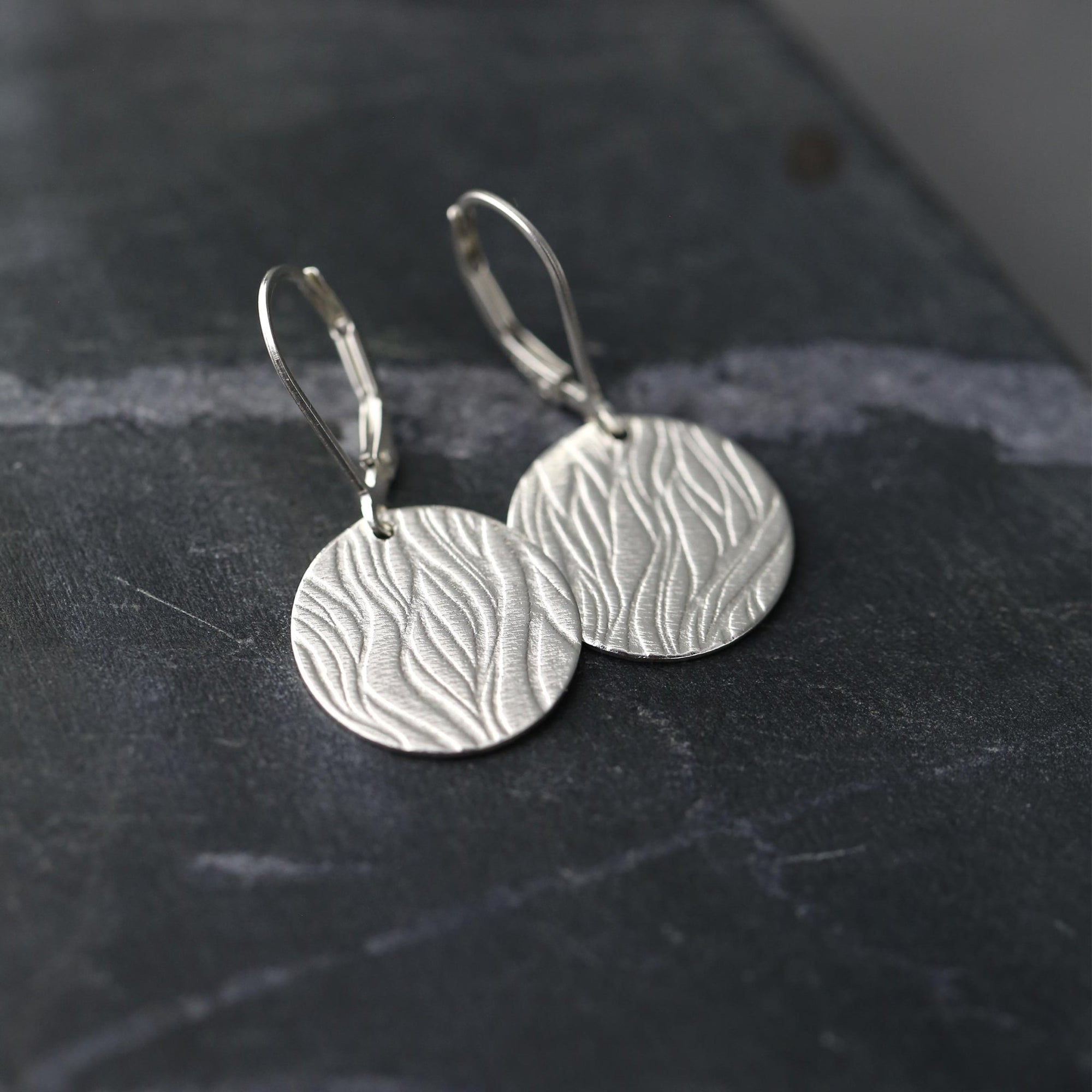 Silver Waves Disc Earrings jewelry handmade by Burnish