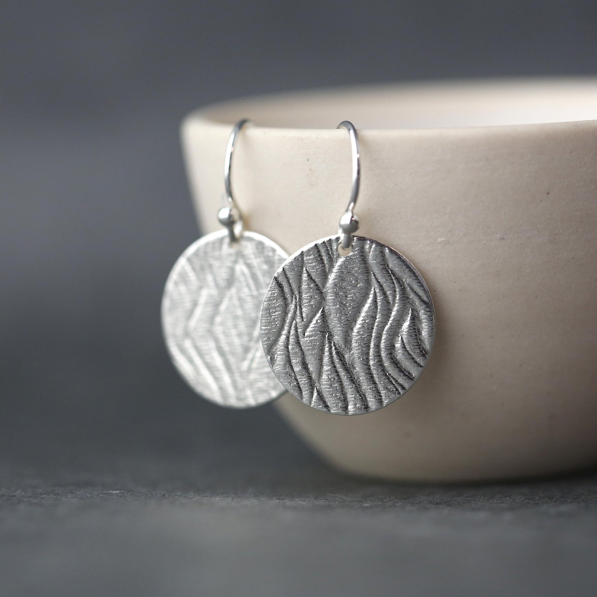 Silver Waves Disc Earrings jewelry handmade by Burnish