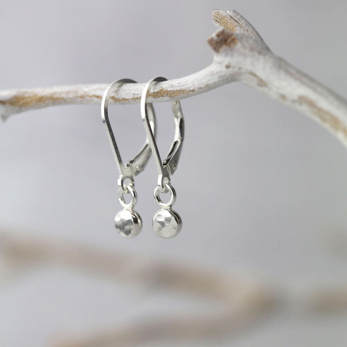 HAMMERED DOTTED SILVER EARRINGS main image 1
