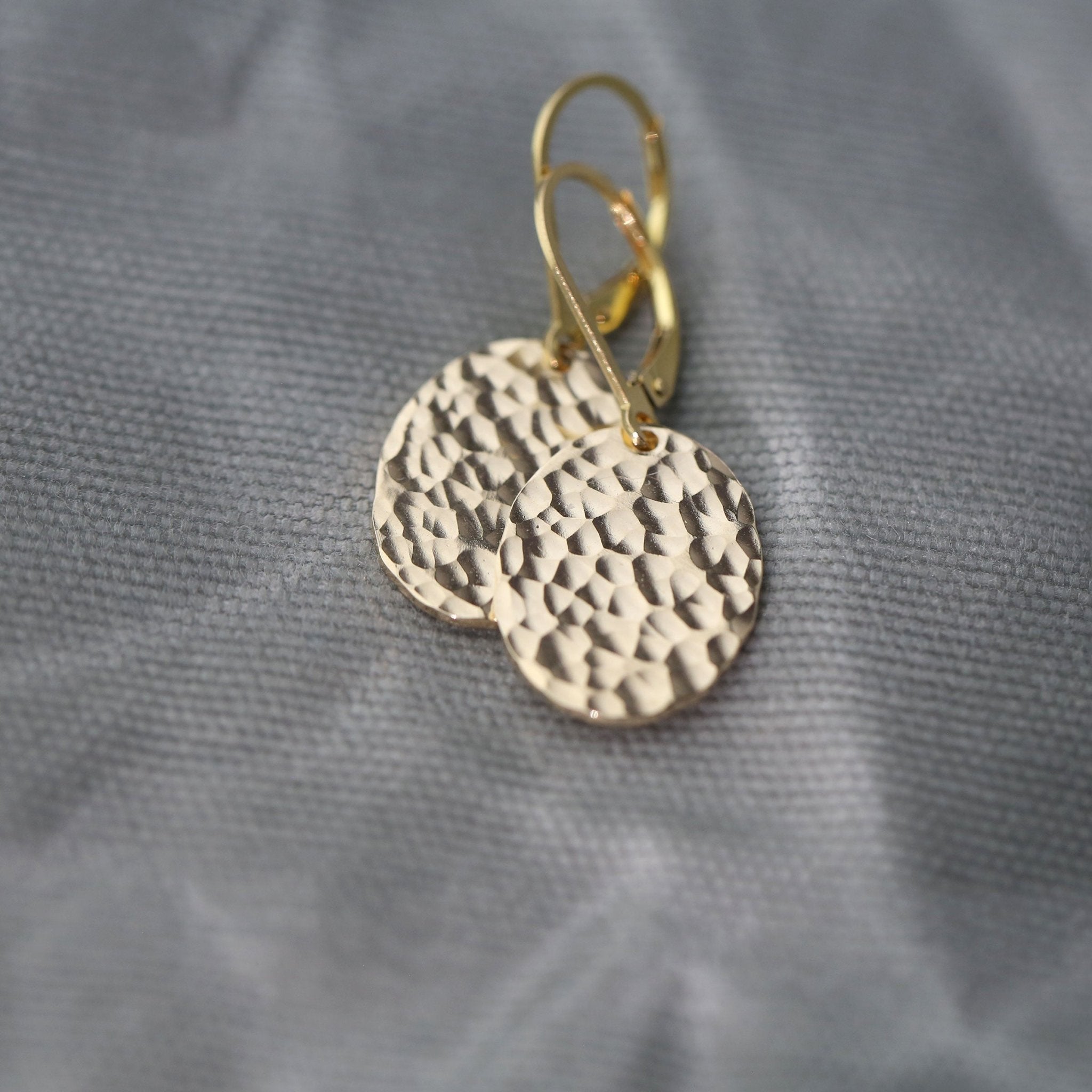 Oval Hammered Gold Lever-back Earrings handmade by Burnish