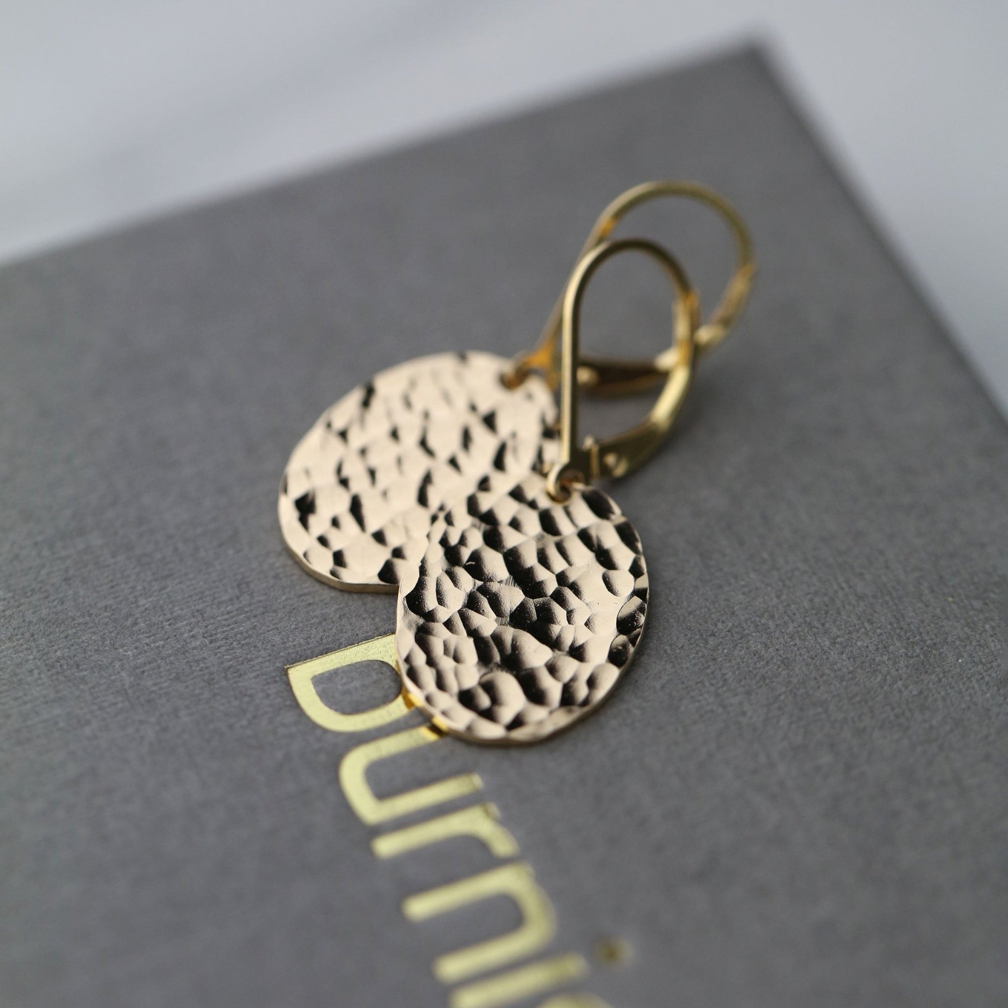 Oval Hammered Gold Lever-back Earrings handmade by Burnish