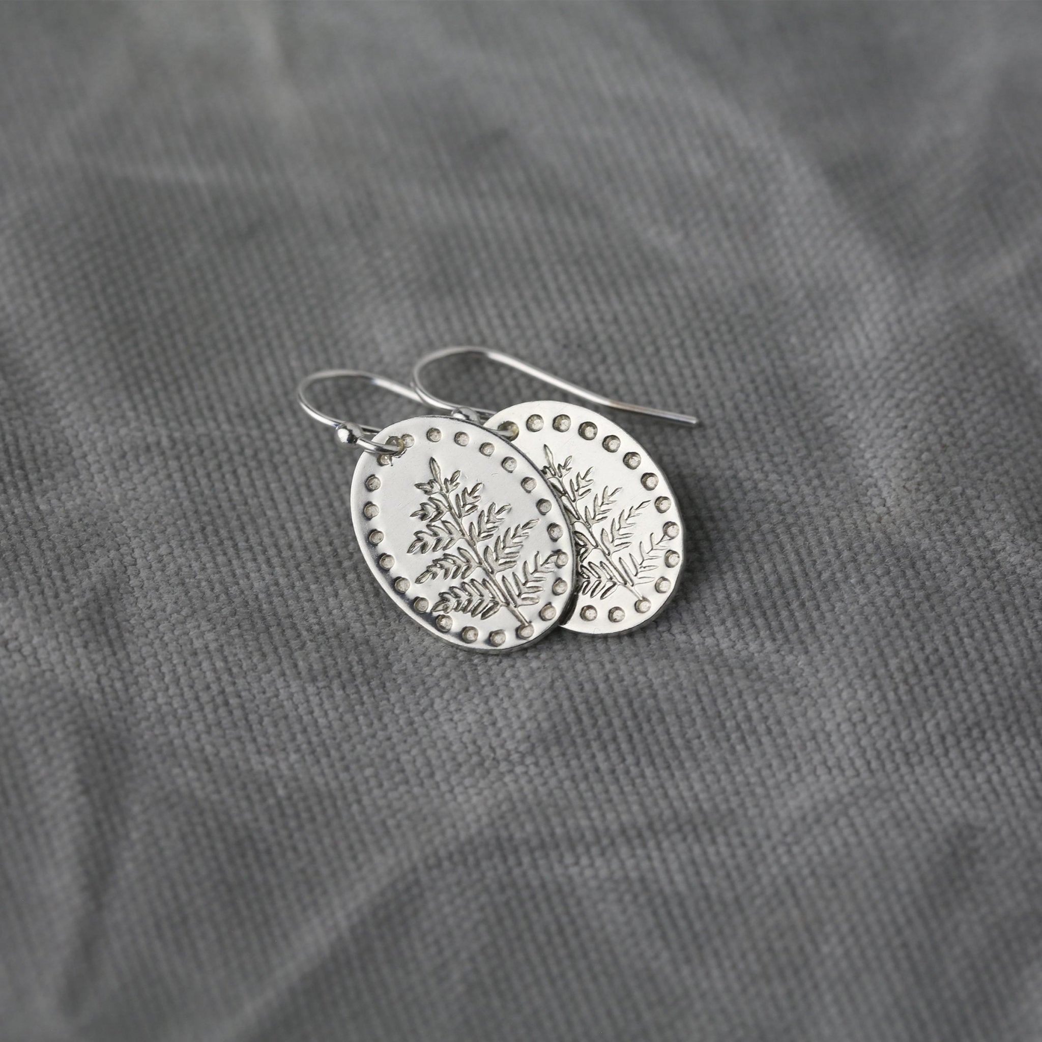 Silver Oval Stamped Leaf Earrings handmade by Burnish